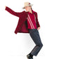Model striking a bold pose in The Drift hat styled with tailored black pants and rich burgundy jacket for contrast.