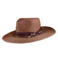 Brown woven straw hat with wide brim, vintage-style feather accent, and distressed ribbon band. Designed by Fallenbrokenstreet for sun protection and timeless summer style.

