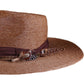 Side profile of the brown straw hat showing the full 12cm brim, vintage ribbon, and layered feather detail. Ideal for outdoor events, festivals, or long sun-drenched days.
