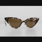 Video thumbnail of The Astral Plane – Moondust/Amber sunglasses showing the product’s sculptural angles and reflective acetate in motion. A rotating view of design, lens tint, and detailing for online shoppers.

