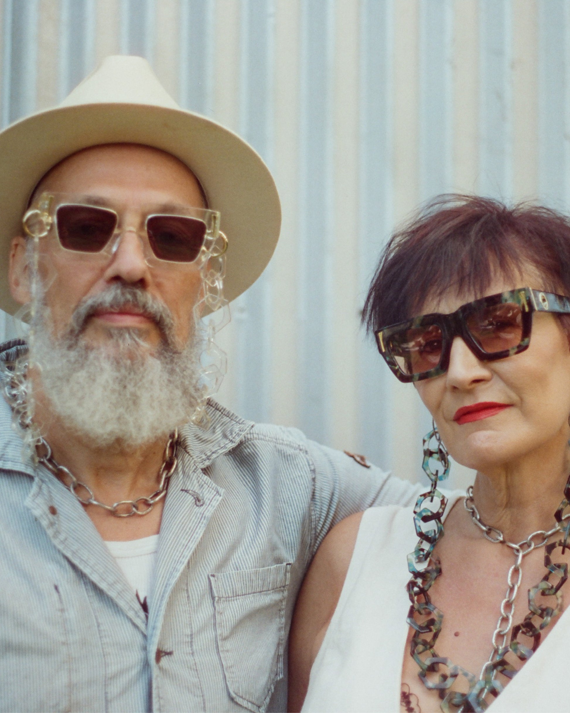 Two older models wearing Fallenbrokenstreet sunglasses, including The Mischief – Skywalker/Amber, styled in coordinated neutral tones.

